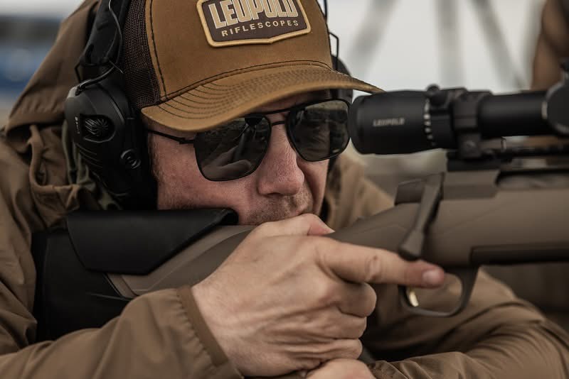 Cody Robbins Looking through a Leopold Riflescope