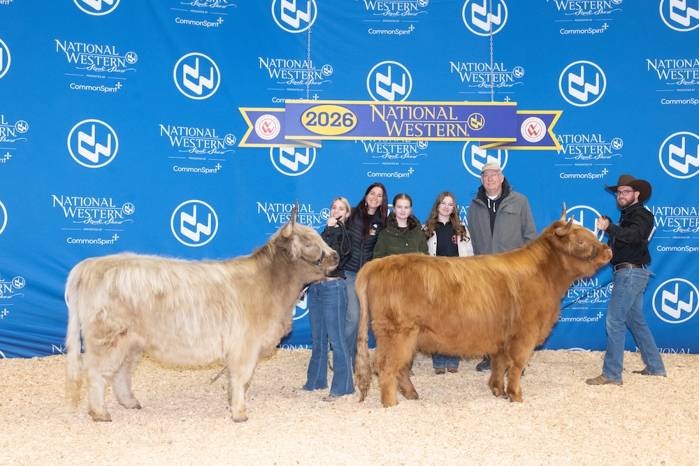 Sheppard Family at National Western Competition 2026 with Two Highland Cows
