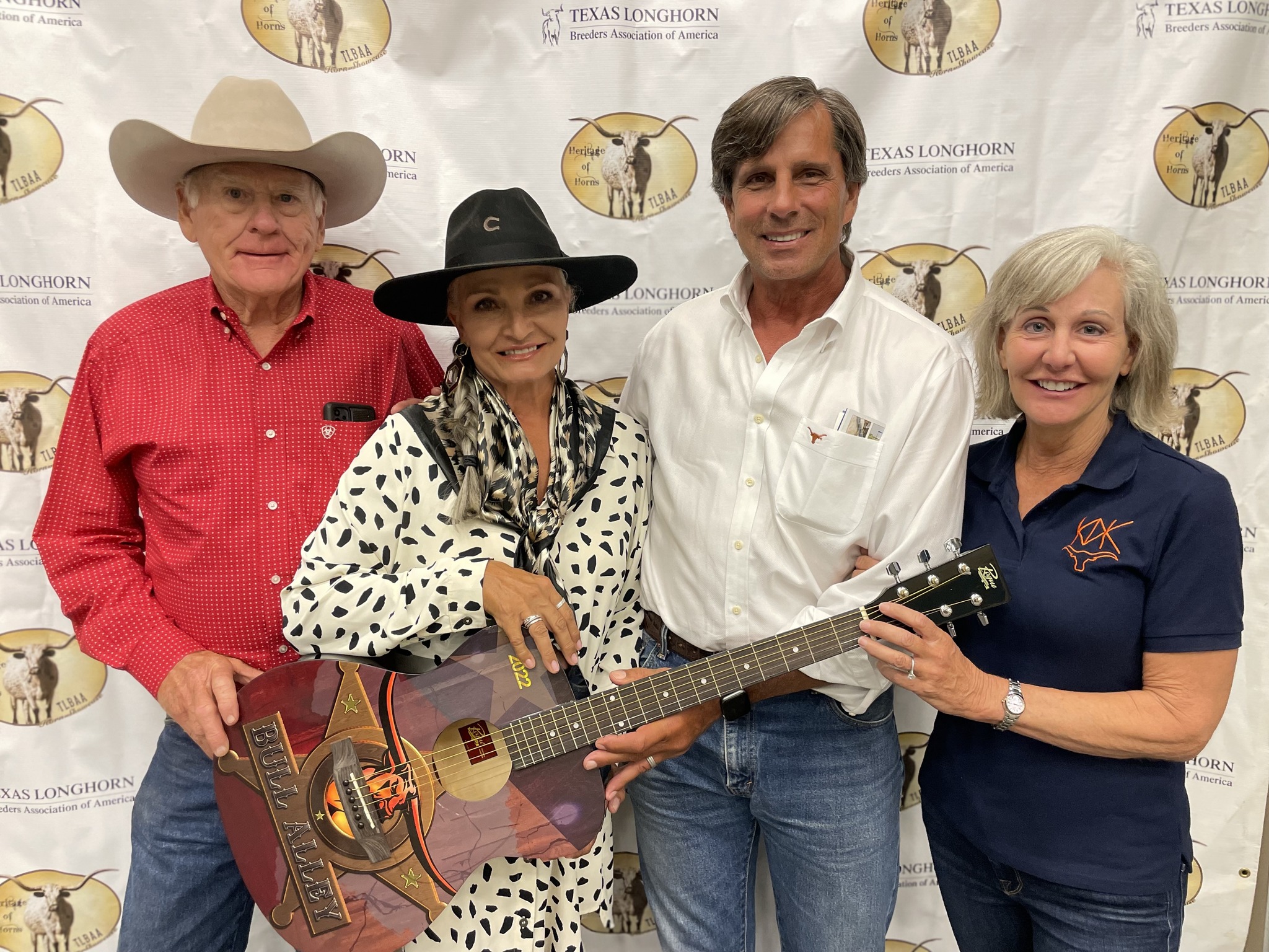 Hired Hand customers Bull Alley award winners Larry & Toni Stegemoller, TL Longhorns and Kent Mayes & Janet Harman, KDK Longhorns