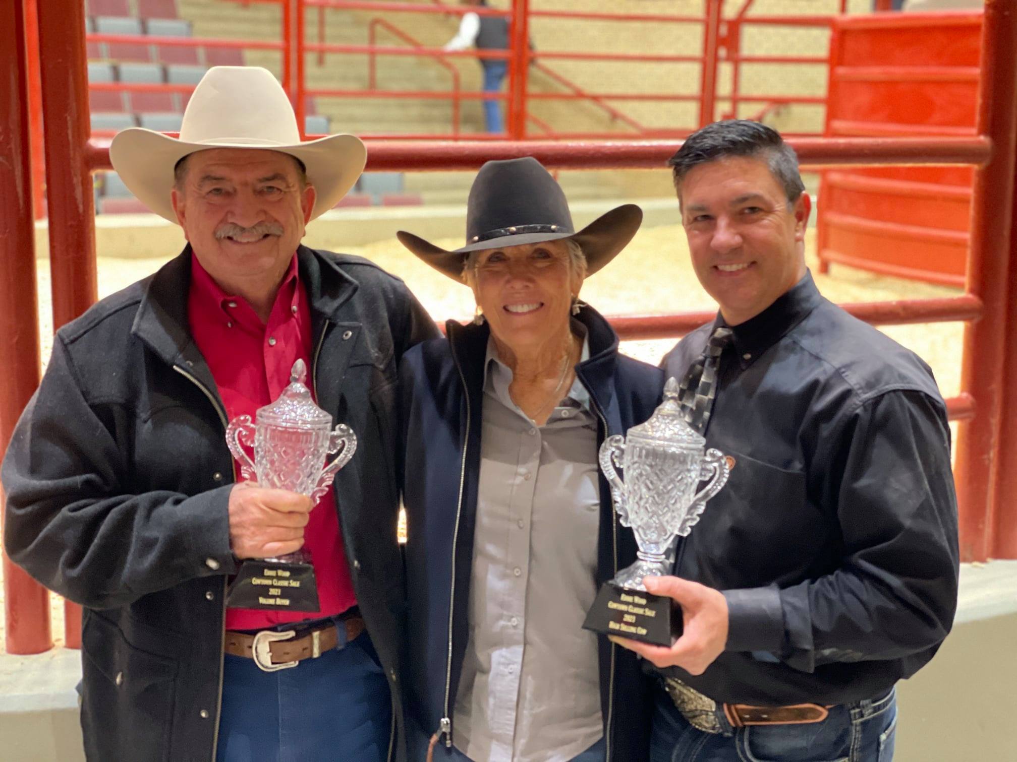 TLBAA Board Chair, Keith DuBose; Award winner and Hired Hand customer Suzanne Torkildson, Bull Creek Ranch; with Sale Host and Hired Hand customer Russell Fairchild, Fairchild Longhorn Enterprises